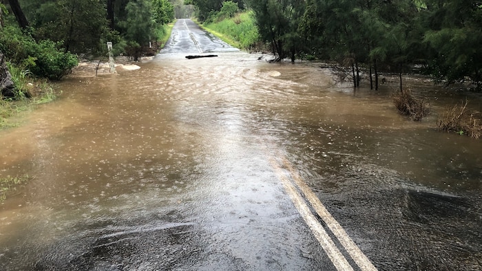 BOM says threat of flooding, storms in Queensland to ease after heavy rainfalls break November records