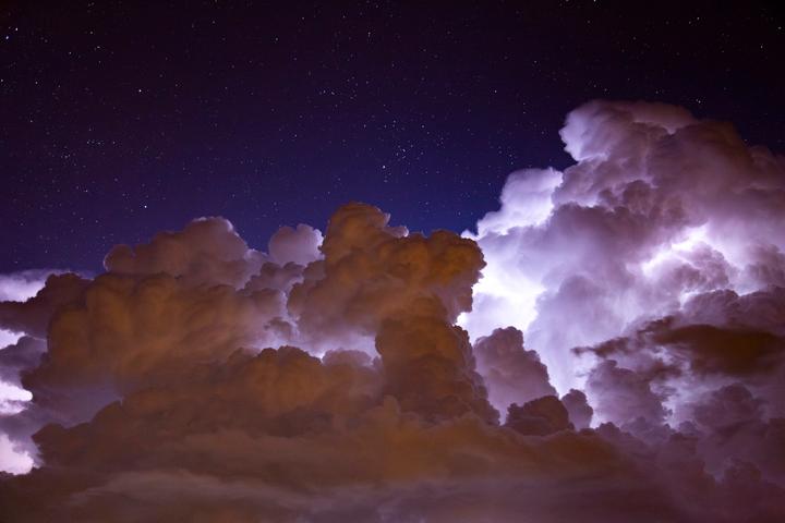Image: Abundant sheet lightning high in the clouds over coastal NSW seemed to light up the sky for seconds at a time. Source: iStock/FGM