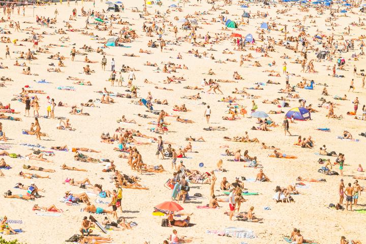 Image: It was hard to find real estate on Sydney beaches even though it was almost too hot to venture outdoors. Source: iStock/ampueroleonardo