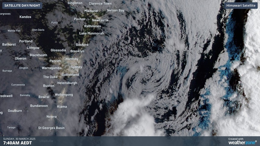 Image: The sun rises over a developing low off the NSW coast. Source: Weatherzone