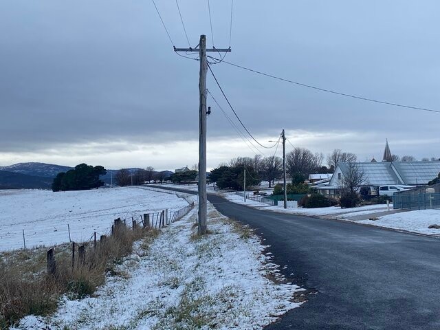 Image: A snowy streetscape in Adaminaby, NSW, on June 9, 2025. Source: MattyHoll via ski.com.au