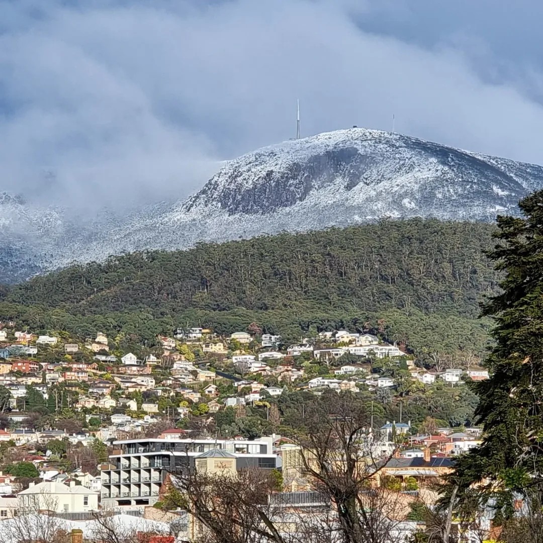 Image: kunanyi/Mt Wellington above Hobart was snow-covered to at least halfway down on Thursday, September 4, 2025. Source: Source: Barbara Iobst-Gonda (@oziobost) on Instagram