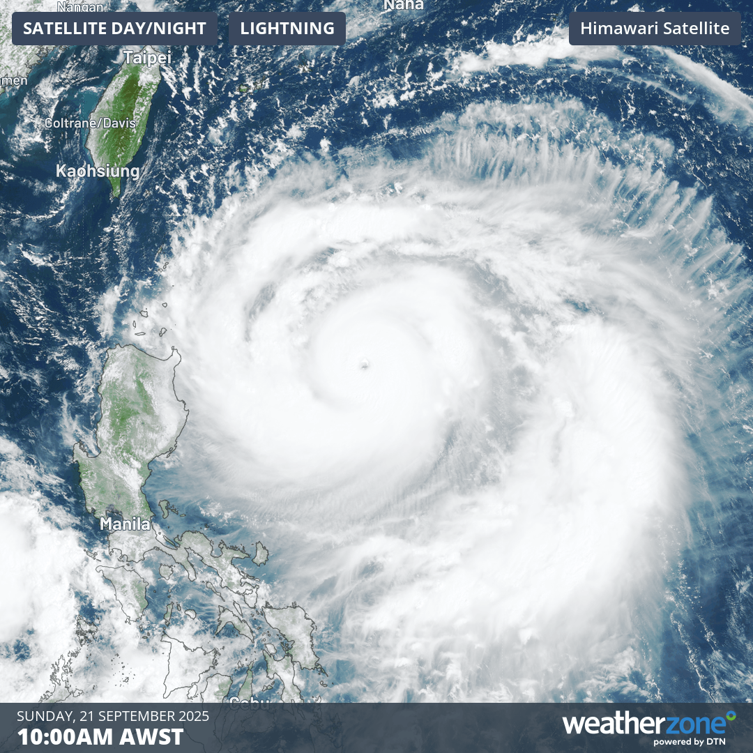 Image: Visible true-colour satellite image at 10 a.m. Philippine time on Sunday, 21 September 2025, showing Typhoon Nando (international name Ragasa) swirling east of Luzon. Source: Weatherzone