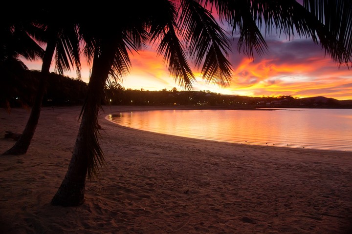 Image: Sunset at Airlie Beach, Queensland. Source: iStock / Kokkai Ng