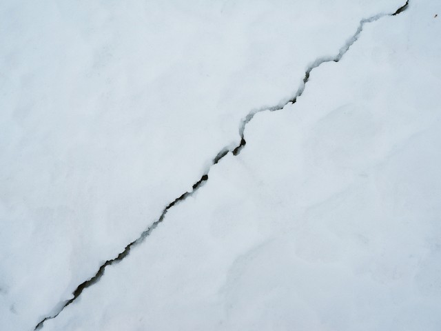 Image: Cryoseisms, also called frost quakes, can cause the ground to crack under pressure. Source: iStock / Enskanto