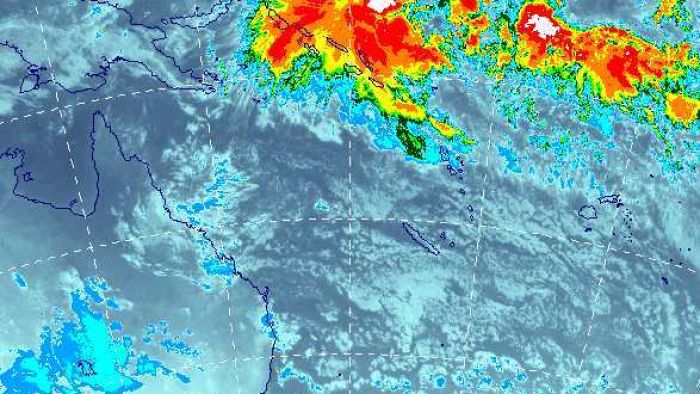 Tropical low north of Coral Sea could become Queensland's first July cyclone, forecaster says