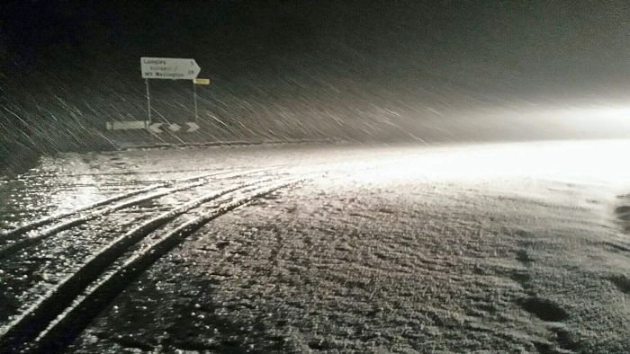 Police rescue motorists stranded in heavy snowfall in Tasmania's south