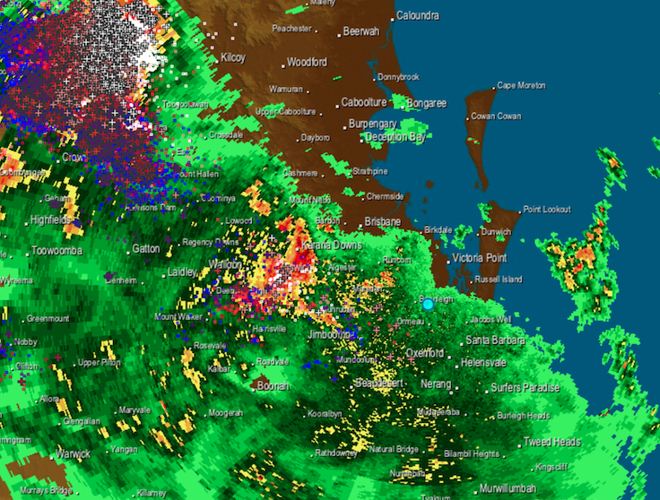 Storms in southeastern Queensland bring a month's worth of rain