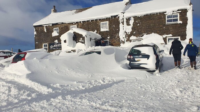 Oasis tribute band fans spend three days snowed in at Tan Hill Inn in Yorkshire after Storm Arwen