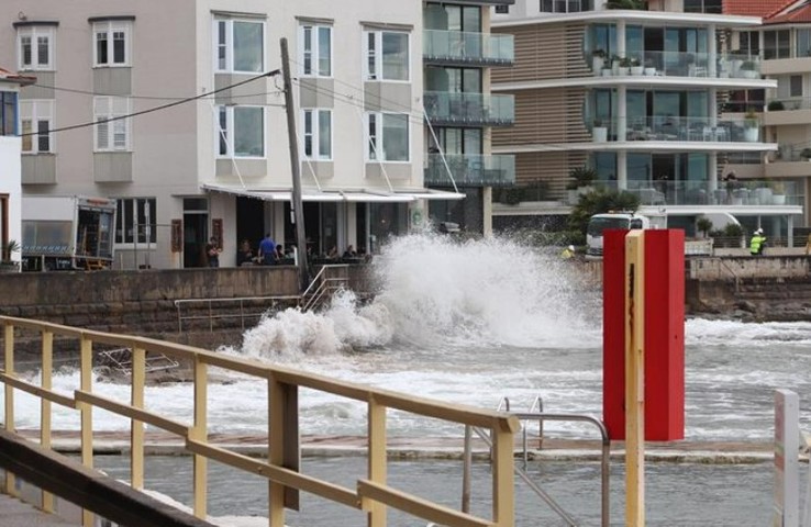 Sydney beaches disappear in huge coastal swell